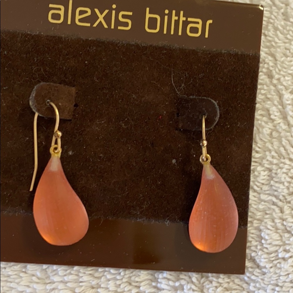 Beautiful orange glow Alexis Bittar earrings.